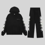 Front view of the Sp5der Stone Tracksuit in Black, a premium 13oz cotton fleece streetwear set with web graphics.