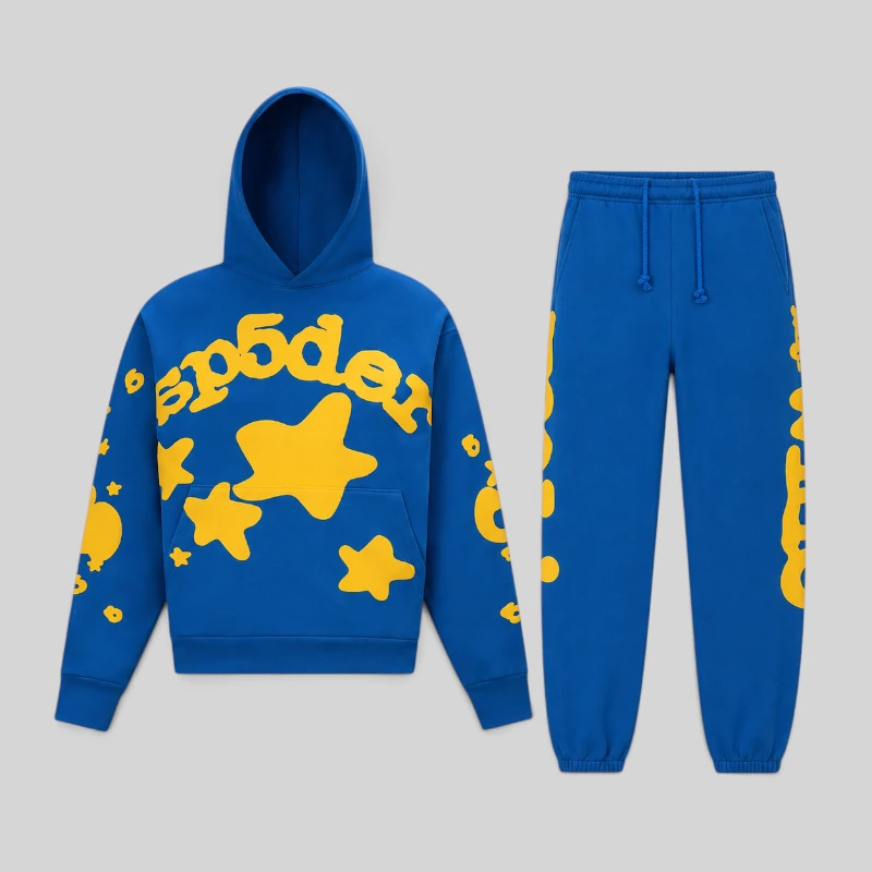 Sp5der Beluga Tracksuit TC Blue featuring blue heavyweight cotton fleece with yellow signature puff print star graphics