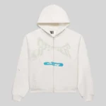 Front view of the Sp5der T&F Zip Up Hoodie in white, featuring signature graphic prints and a front zip closure.