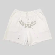 Front view of white Sp5der T&F fleece sweatshorts featuring signature star and puff print graphic design details.