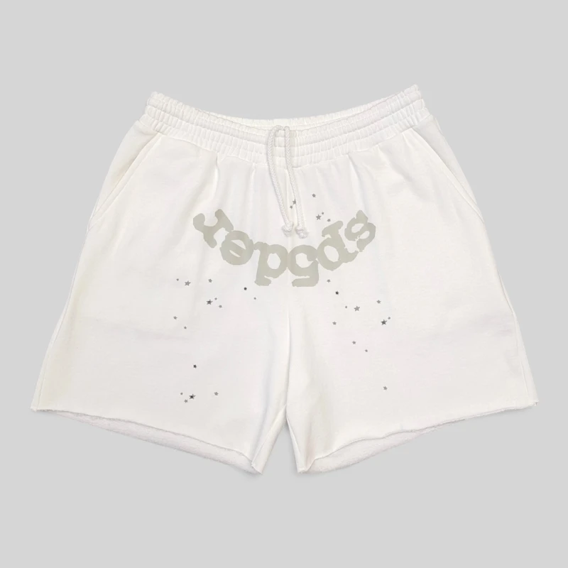 Front view of white Sp5der T&F fleece sweatshorts featuring signature star and puff print graphic design details.