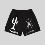 Front view of the Sp5der VAA Double Layer Short in black, featuring white graphic prints and technical nylon design.