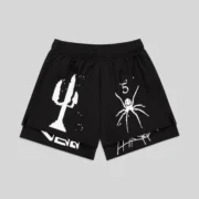 Front view of the Sp5der VAA Double Layer Short in black, featuring white graphic prints and technical nylon design.