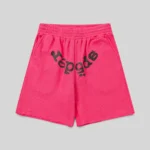 Front view of pink Sp5der Vvs Sweatshorts featuring iced-out rhinestone detailing and signature SP5DER graphic logo.