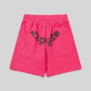Front view of pink Sp5der Vvs Sweatshorts featuring iced-out rhinestone detailing and signature SP5DER graphic logo.