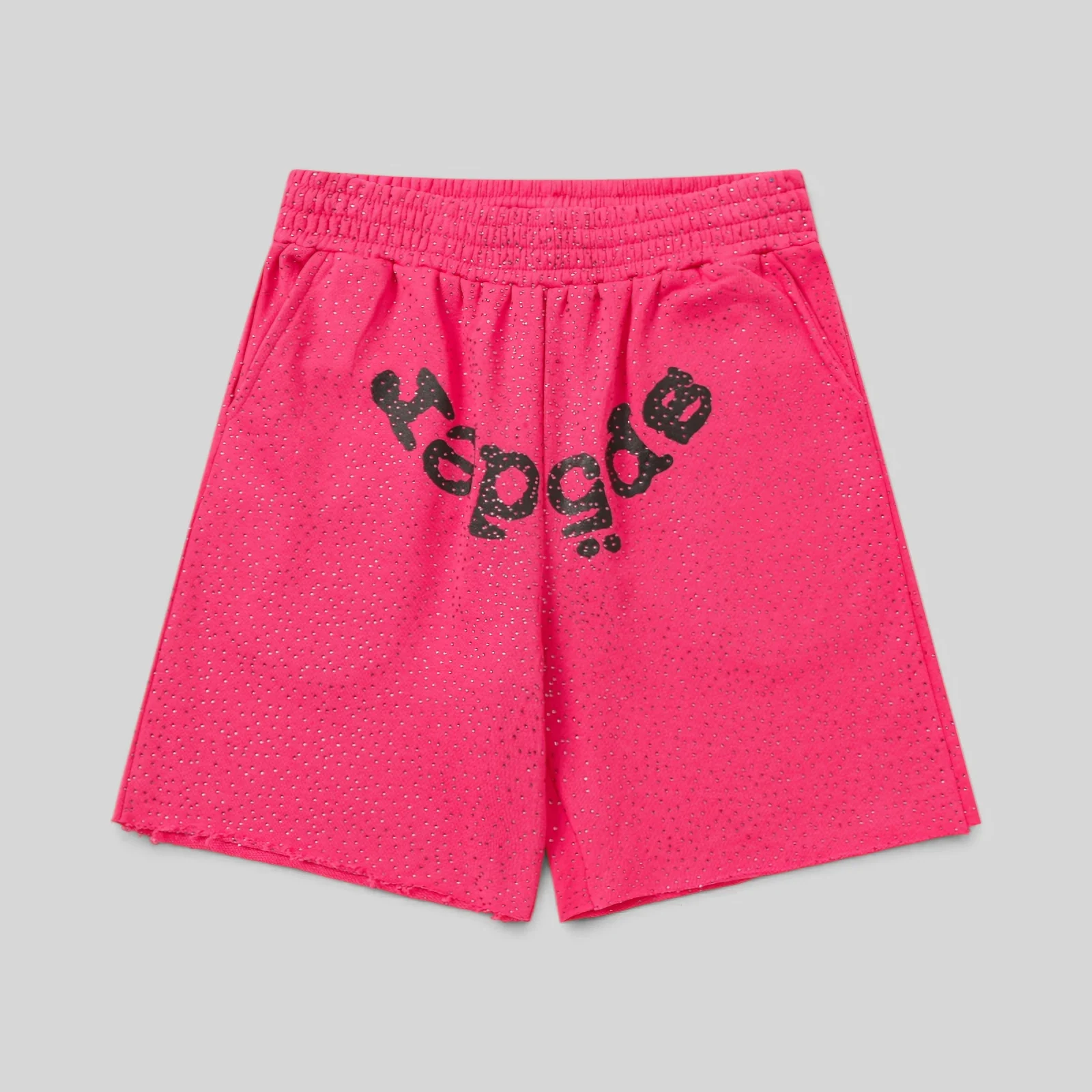 Front view of pink Sp5der Vvs Sweatshorts featuring iced-out rhinestone detailing and signature SP5DER graphic logo.