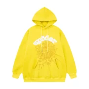 Front view of the vibrant yellow Sp5der Web Hoodie featuring the iconic spider web graphic design for men and women.