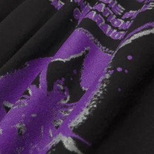 Close up view of the black Sp5der France Blur t-shirt featuring a detailed purple blurred spider graphic print.