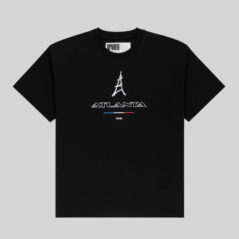 Front view of the black Sp5der Araignée Tee featuring an embroidered Atlanta Paris Eiffel Tower graphic logo.