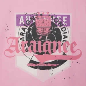 A close-up view of the Sp5der Overprint Araignee Tee showing the detailed graphic print on soft pink fabric material.
