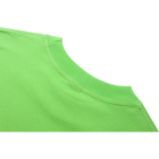 Close-up of the green collar and premium fabric on the Sp5der Wait Web T-shirt for a streetwear urban aesthetic.