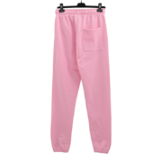 Back view of the pink Sp5der Atlanta sweatpants hanging on a hanger, showcasing the premium cotton construction.