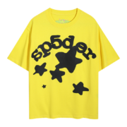 Front view of the Sp5der Worldwide Star Beluga T-shirt in bright yellow with a black cosmic star graphic print.