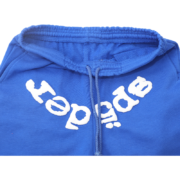 Royal blue Sp5der Websuit sweatpants featuring iconic white distressed logo detail and an elasticated drawstring waist.