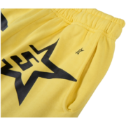 Yellow Sp5der 5Star sweatpants featuring a bold black graphic print and an elasticated waistband for a streetwear look.