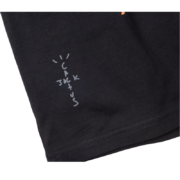 Close-up of the Cactus Jack branding detail on the black SP5DER x Cactus Jack x ComplexCon exclusive streetwear tee.