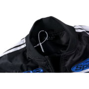Close-up of the Sp5der Satin Bomber Jacket collar and brand label detail featuring signature Sp5der logo branding.