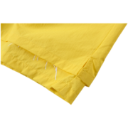 Close-up of the bright yellow Sp5der OG Web Double Layer Shorts showing the unique fabric and layered construction.