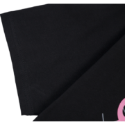 Close-up view of the premium black cotton fabric texture from the Sp5der Atlanta print t-shirt featuring graphic detail.