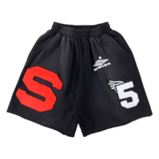 Front view of the black Sp5der cut sweatshorts featuring red and white graphic logo patches and premium construction.