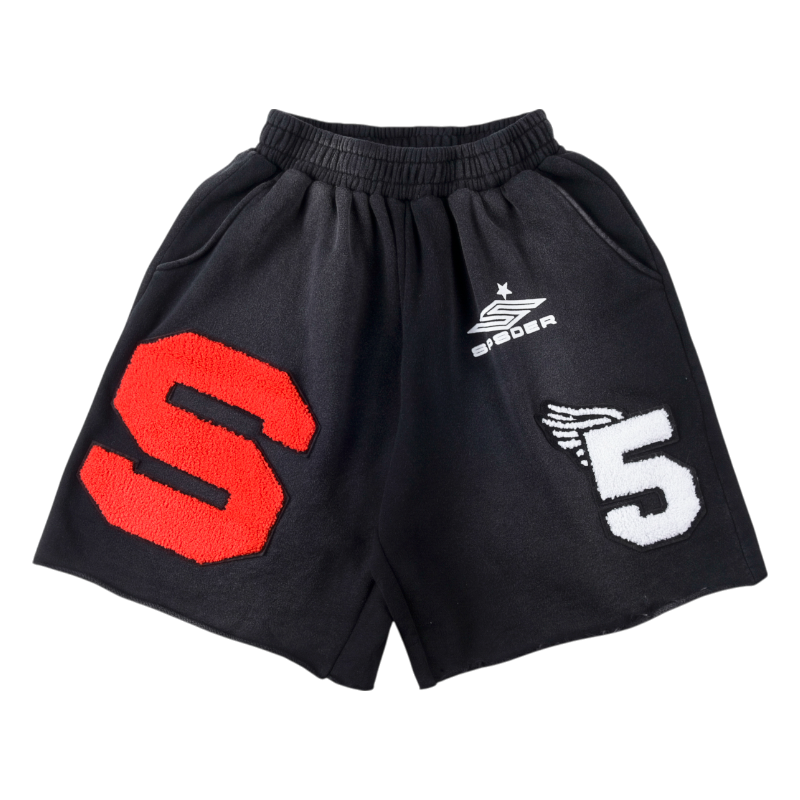 Front view of the black Sp5der cut sweatshorts featuring red and white graphic logo patches and premium construction.