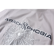 Sp5der Arach NY Phobia gray cotton t-shirt featuring an edgy graphic of a spider web and bold urban lettering.