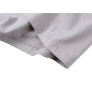Detailed view of the gray cotton fabric texture on the Sp5der Arach NY Phobia streetwear t-shirt for urban style.