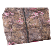 The SP5DER Real Tree Puffer Vest features an iconic camouflage pattern and premium insulation for stylish, warm wear.