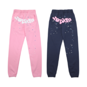 Sp5der Atlanta unisex sweatpants set in pink and blue featuring high-quality cotton fabric and iconic branding