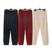 Sp5der OG Tree Camo sweatpants collection featuring black, red, and cream pairs with iconic brand logo branding.
