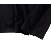 Detailed look at the premium cotton fabric texture used for the black SP5DER Jeff Free streetwear t-shirt.