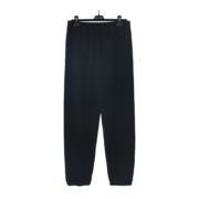 Front view of the black Sp5der OG Tree Camo sweatpants hanging on a clothing hanger against a dark background.
