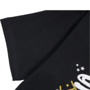 Close-up view of the SP5DER Web Print Gothic Punk T-Shirt showcasing high-quality black fabric and graphic details.