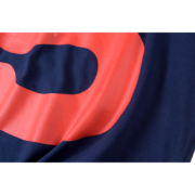A detailed close-up showing the vibrant graphic texture on the premium cotton Sp5der 5 Baby Tee streetwear shirt.