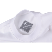 Close-up view of the inner neck label on a Travis Scott Cactus Jack x Sp5der Days Before Rodeo white T-shirt.