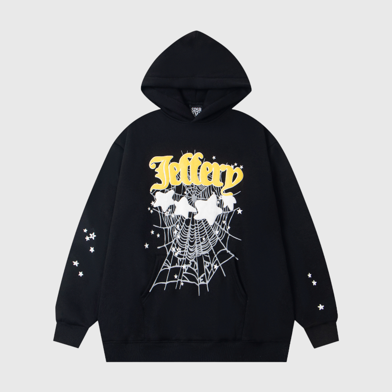 Sp5der Jeffery Black Graphic Hoodie Front View Sp5der Jeffery Black Hoodie featuring bold yellow graphic lettering and iconic spider web and star designs on front.