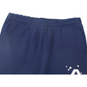 Close-up of the elasticated waistband on the blue Sp5der Arach NY Phobia streetwear sweatpants for men and women.
