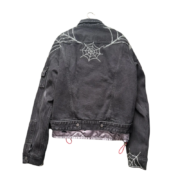Black Sp5der Worldwide denim jacket featuring a signature rhinestone spider web motif on the back for streetwear style.