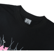 Close-up of the black Sp5der Young Thug Atlanta t-shirt showing the inner neck tag label and graphic details.