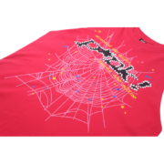 A vibrant pink Sp5der T-shirt featuring an eye-catching spider web graphic and detailed lettering for everyday street style.