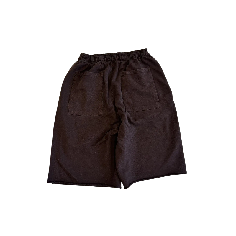 Back view of the limited edition Sp5der x Cactus Jack Rodeo shorts featuring a premium cotton design and elastic waist.