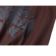 The Sp5der Sp5 Sex Tee in brown features a provocative, high-quality graphic print on a soft, comfortable fabric.