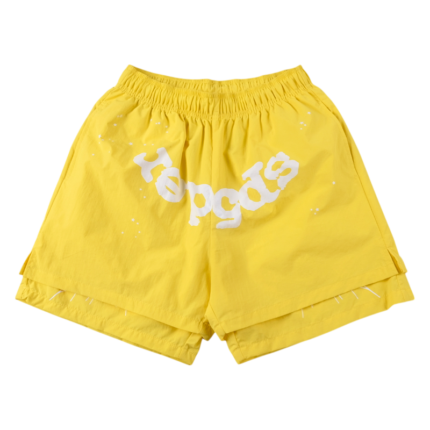 Front view of vibrant yellow Sp5der OG Web double-layer shorts featuring a white signature graphic design and elastic waist.
