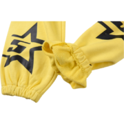 Sp5der 5Star sweatpants in vibrant yellow featuring bold black star logo graphics and elasticated ankle cuffs.