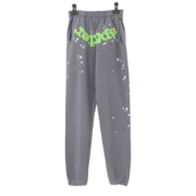 Front view of the grey Sp5der OG Web sweatpants featuring the iconic green web graphic and scattered star details.