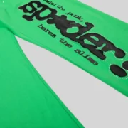 Sp5der Punk V2 Rhinestone Sweatpants 'Bright Green' close up
