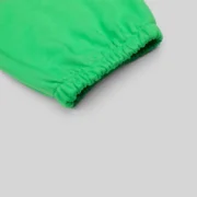 Sp5der Punk V2 Rhinestone Sweatpants 'Bright Green' close up