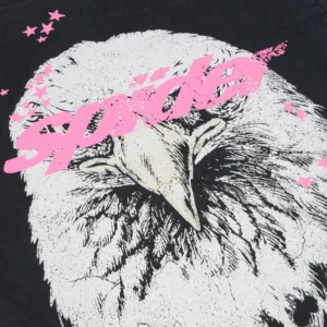 Close up of the black Sp5der Screaming Eagle Tee featuring a white eagle head graphic and pink lettering design.