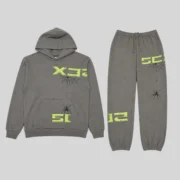 Front view of the slate grey Sp5der 5Ex tracksuit featuring signature web graphics and lime green 5EX text branding.