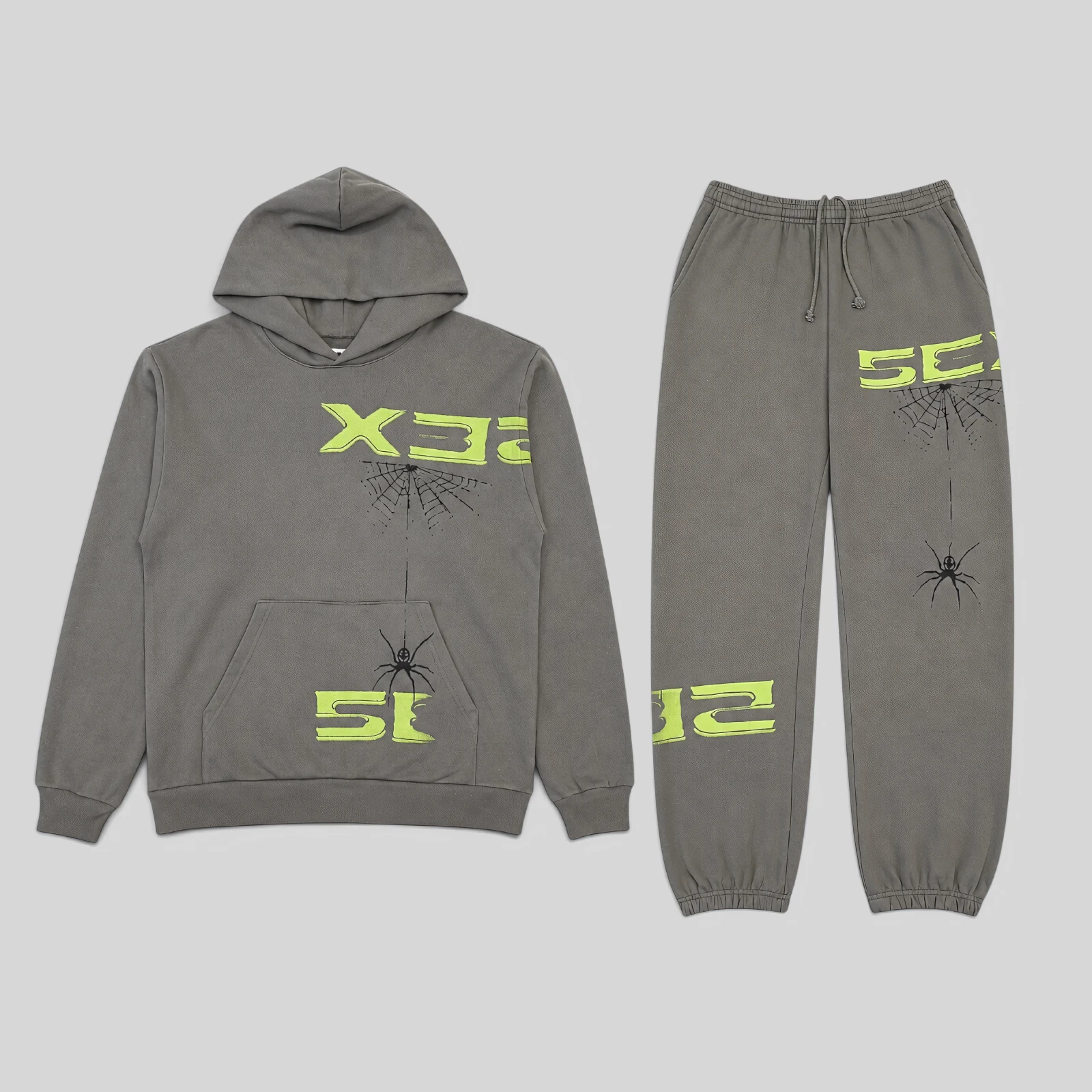 Front view of the slate grey Sp5der 5Ex tracksuit featuring signature web graphics and lime green 5EX text branding.